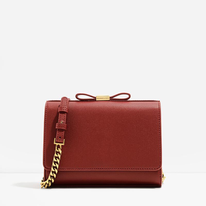 charles and keith bow detail clutch