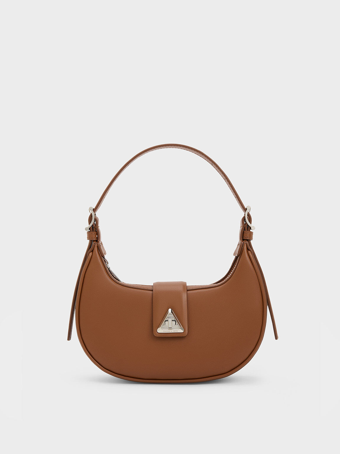 Help look for this cognac bucket bag with top turn lock as seen on