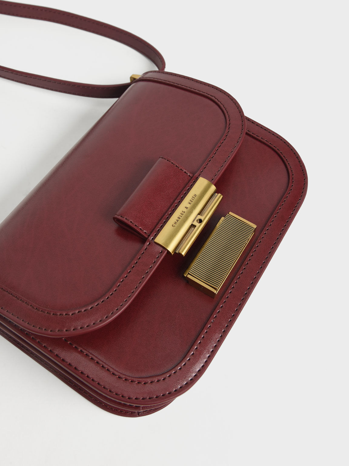 Charles and keith 2025 burgundy bag