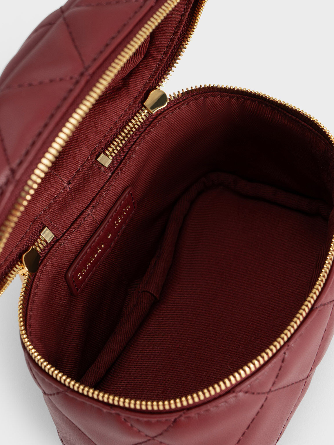 Burgundy Quilted Vanity Pouch - CHARLES & KEITH US