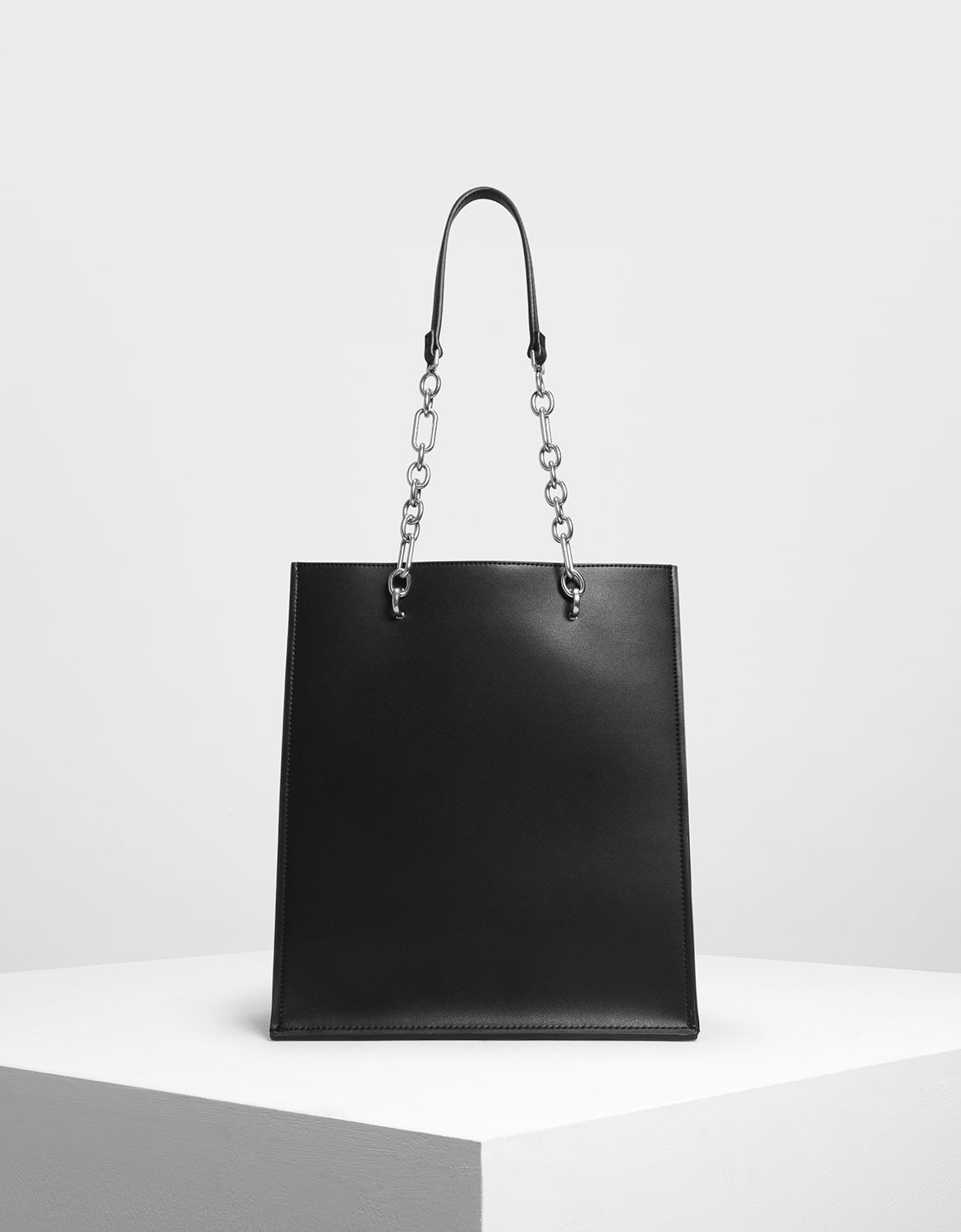 black chain handle bag