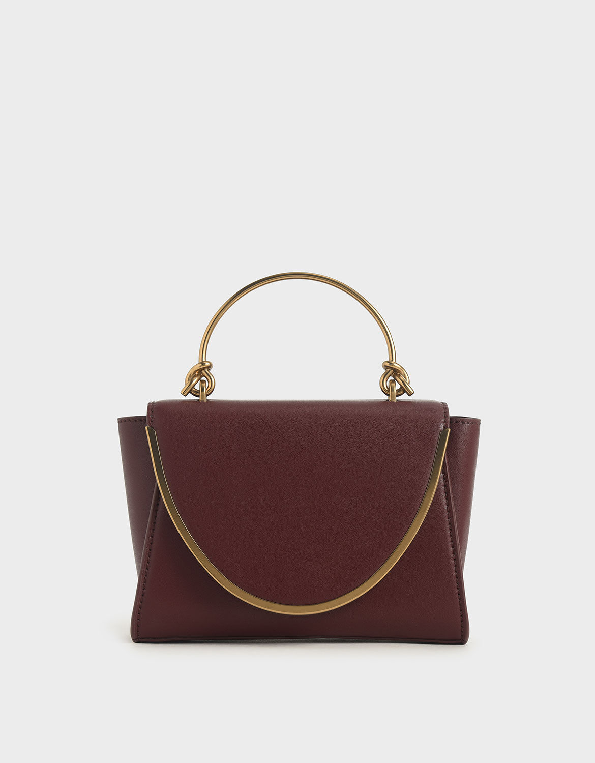 charles and keith rose gold bag