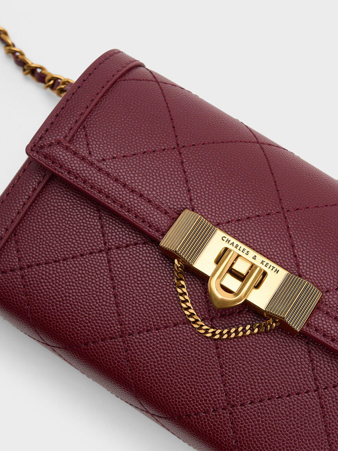 Burgundy Tallulah Quilted Push-Lock Clutch - CHARLES & KEITH 