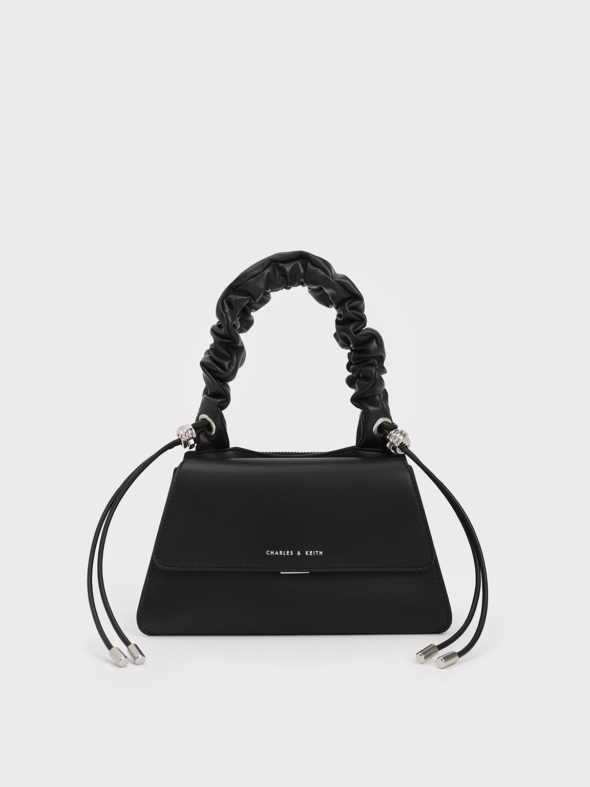 CHARLES & KEITH - Featuring a chunky chain link strap
