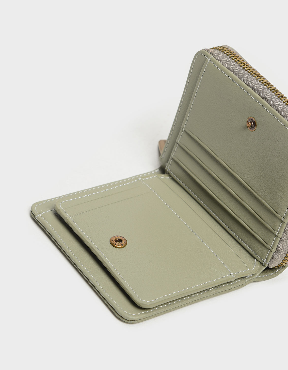Charles & Keith Textured Mini Short Wallet in Green