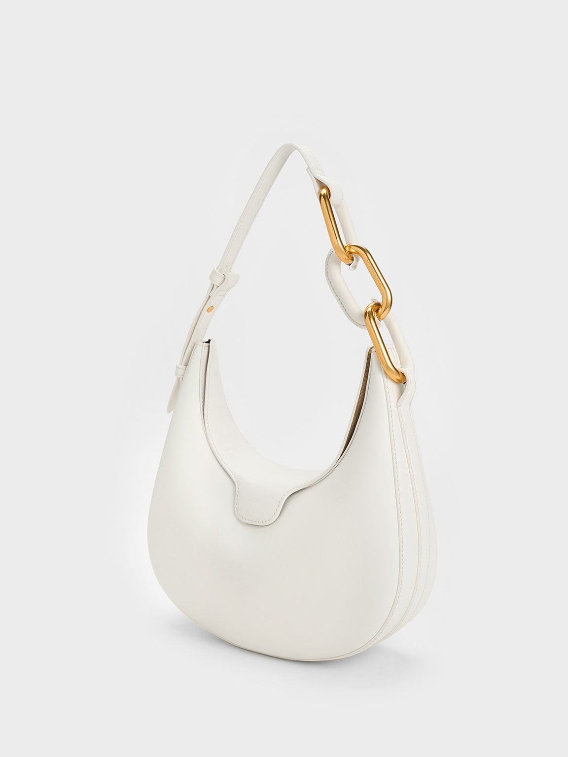 Pristine White Bags Are The Polished Arm Candy Of The Moment