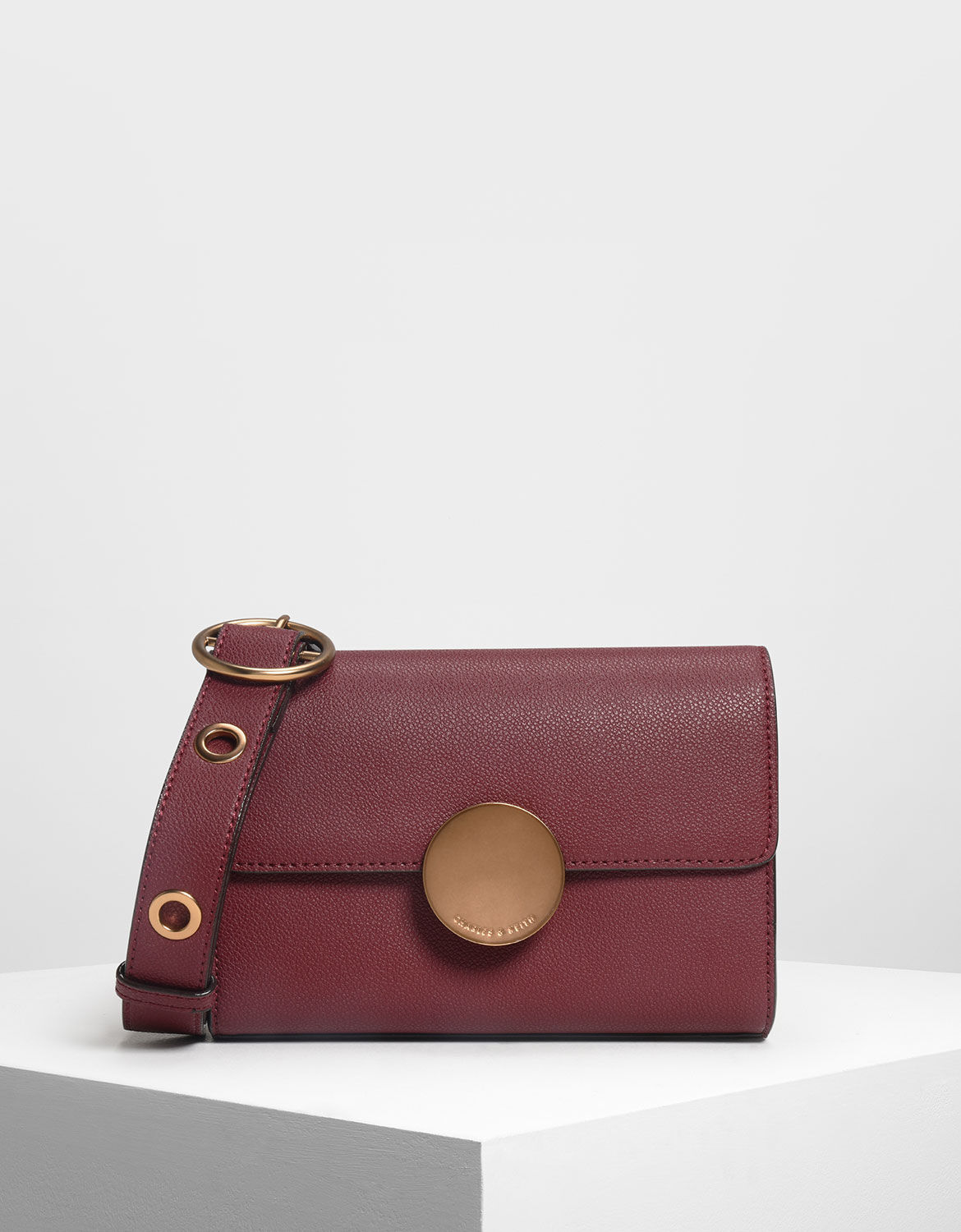 charles & keith circular buckle crossbody