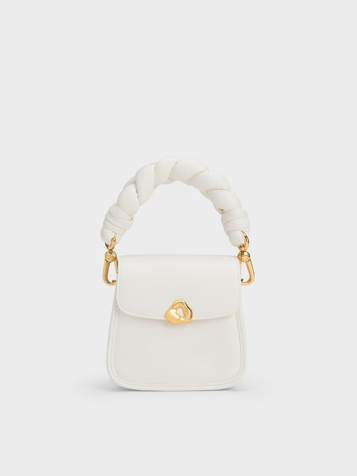Elongated Small' bucket Braided-handle bag Nanushka - IetpShops Curaçao -  The Best Winter White Braided-handle Bags for 2023