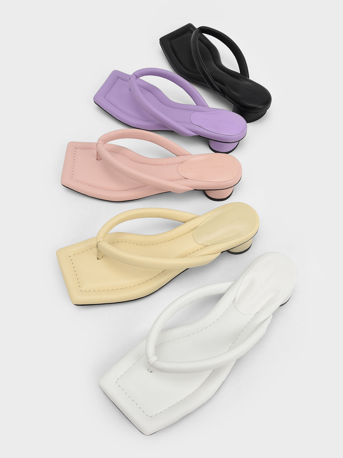 CHARLES & KEITH - The thong sandal is enjoying a revival — our purple  asymmetric-toed version with puffy straps gives the iconic '90s shoe style  a contemporary update. Shop now:   #CharlesKeithCelebrates #