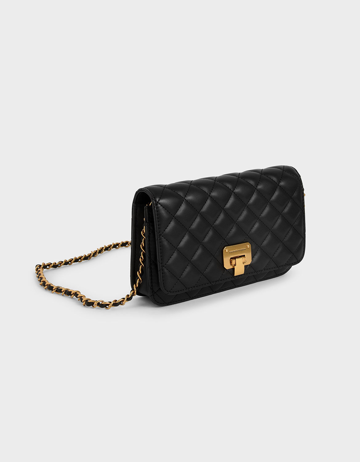 Black Quilted Flip-Lock Clutch - CHARLES & KEITH SG