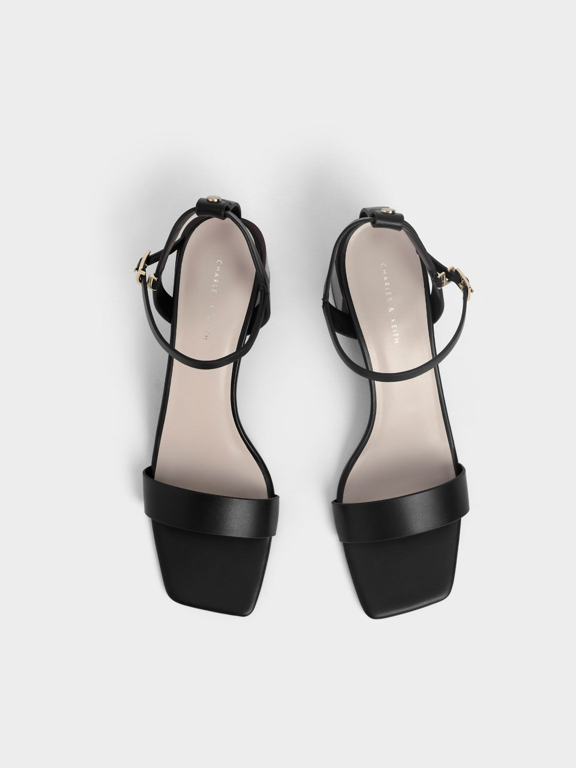 Alexander McQueen white Bow black leather heeled sandals.