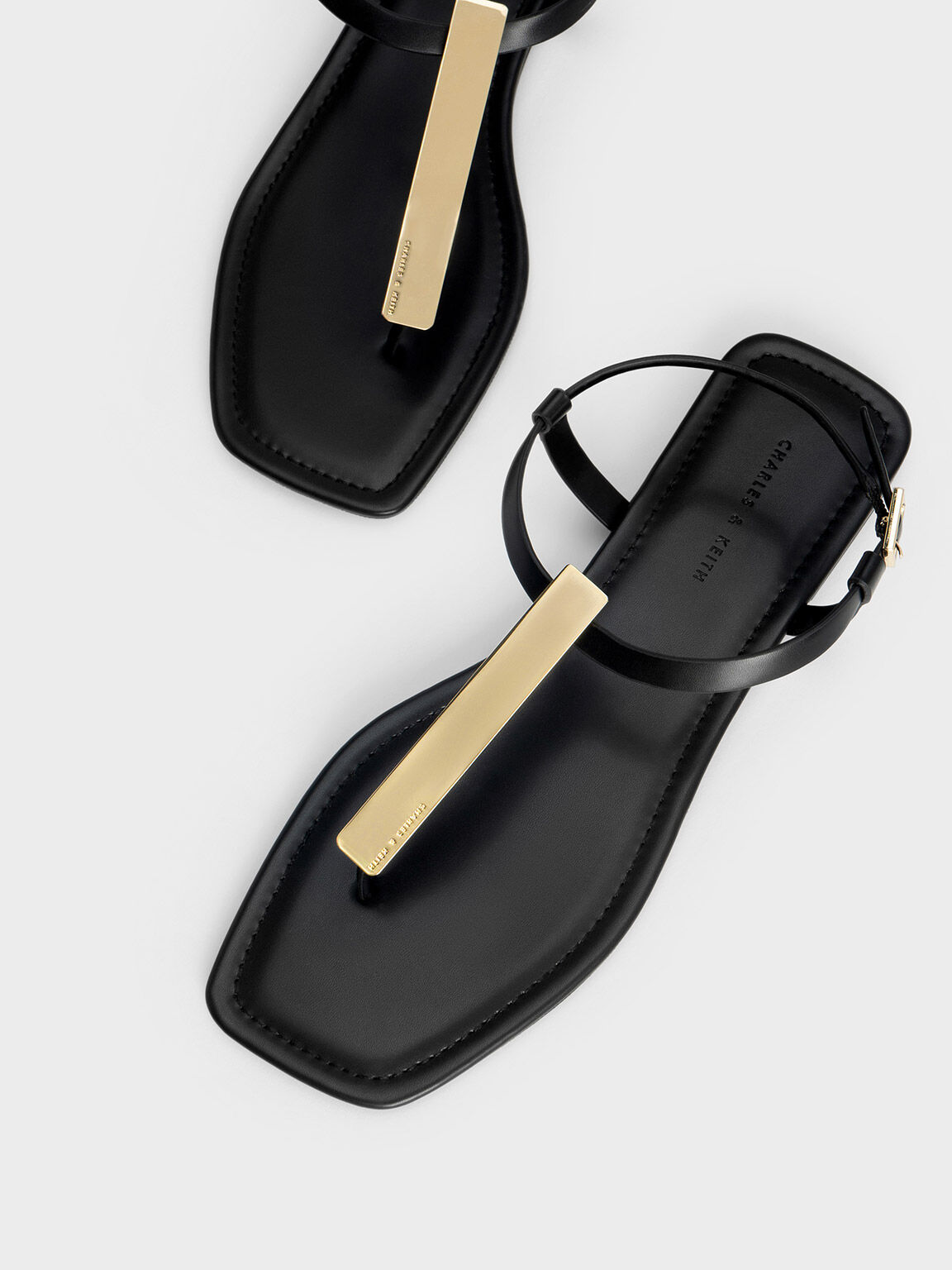 Black Metallic Accent T-Bar Thong Sandals - CHARLES & KEITH US