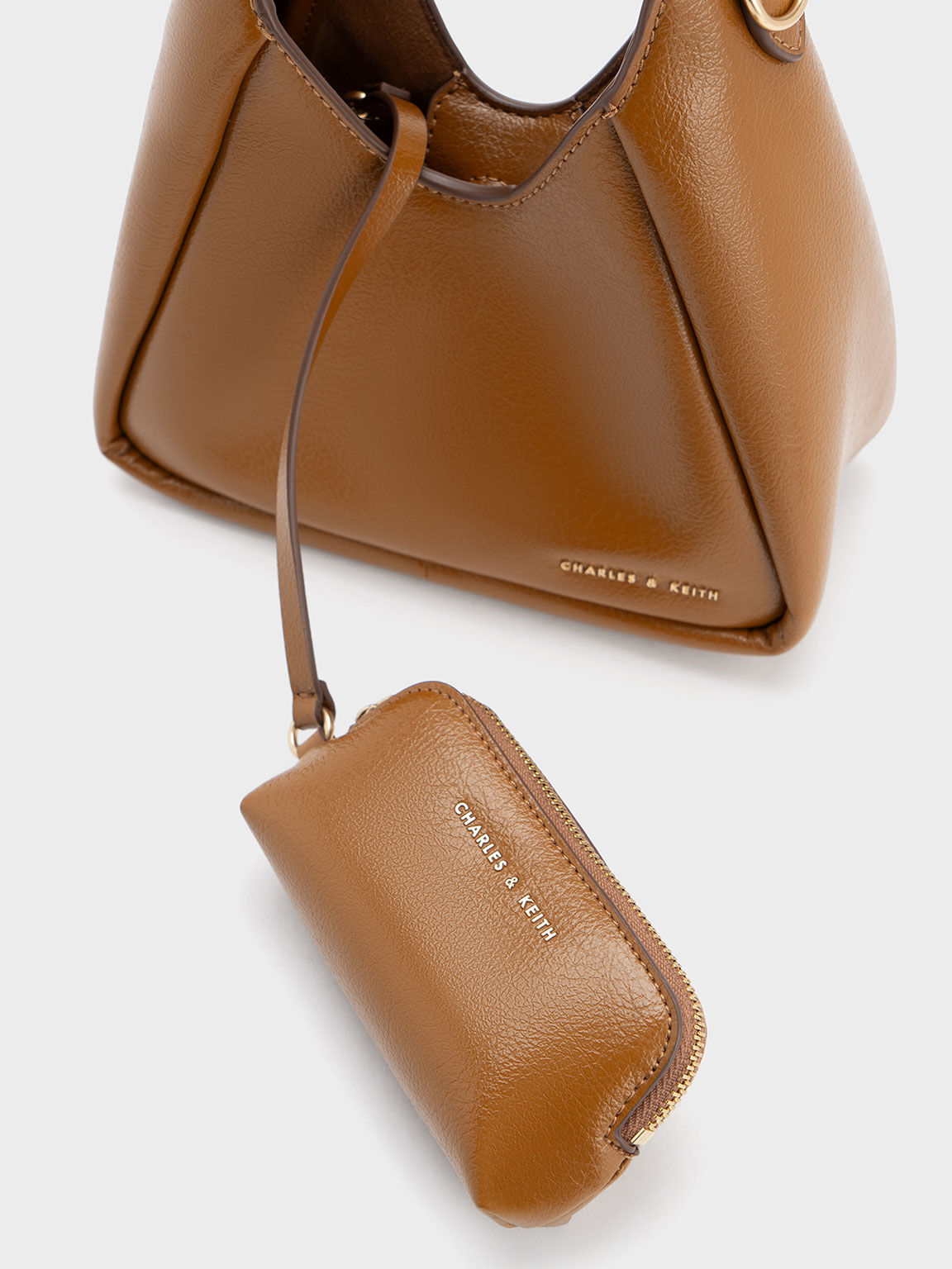 Chocolate Buzz Hobo Bag | CHARLES & KEITH