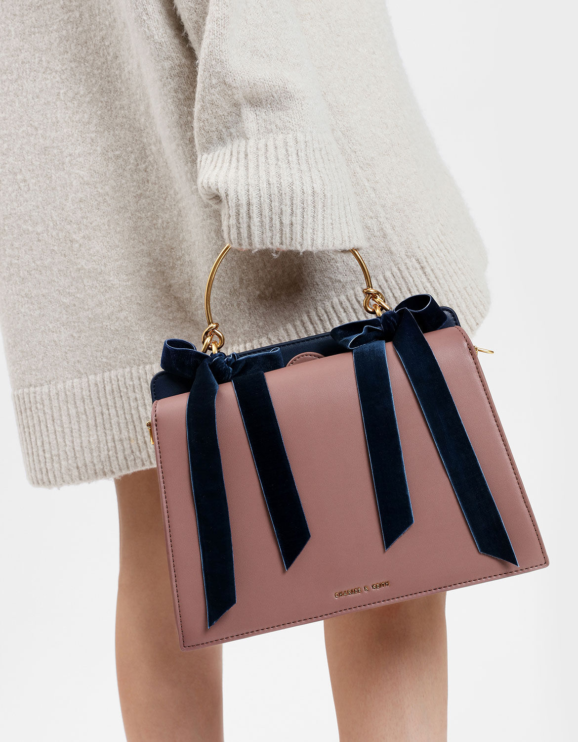 charles and keith bow detail clutch