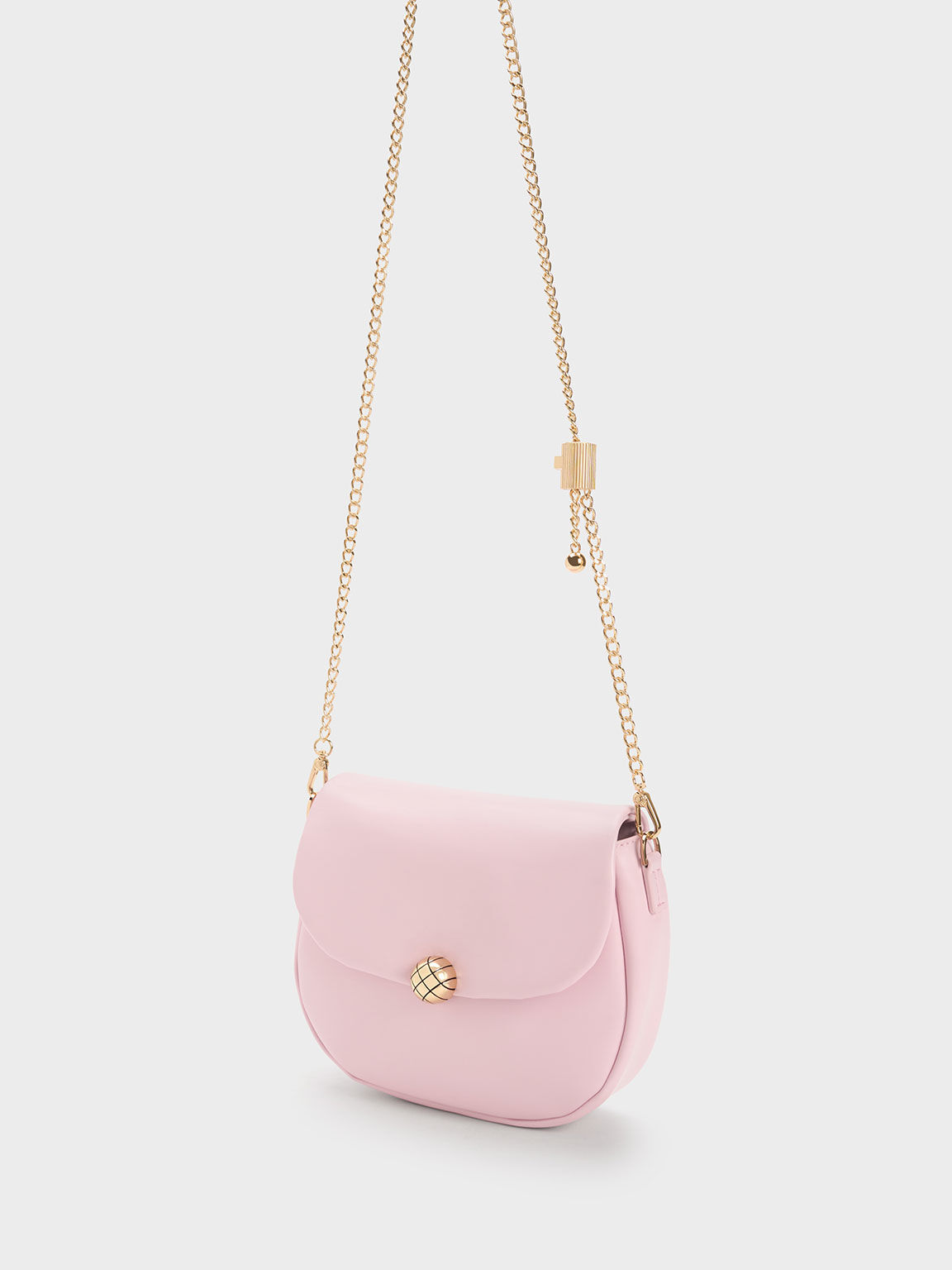 CHARLES & KEITH Small curved pink boxy sling bag