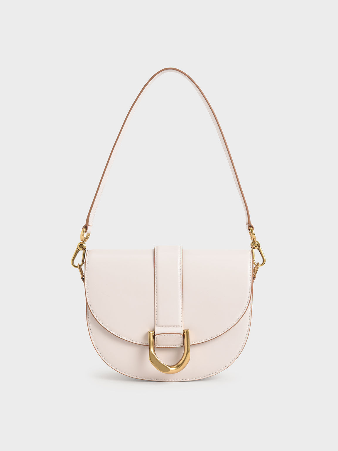 Charles & Keith Micro Gabine Saddle Bag in Pink