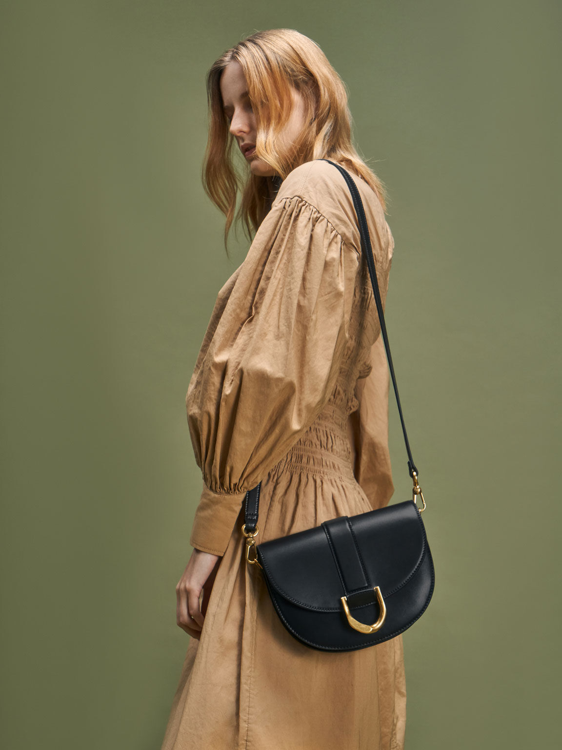 Charles & Keith Mini Gabine Saddle Bag in Natural