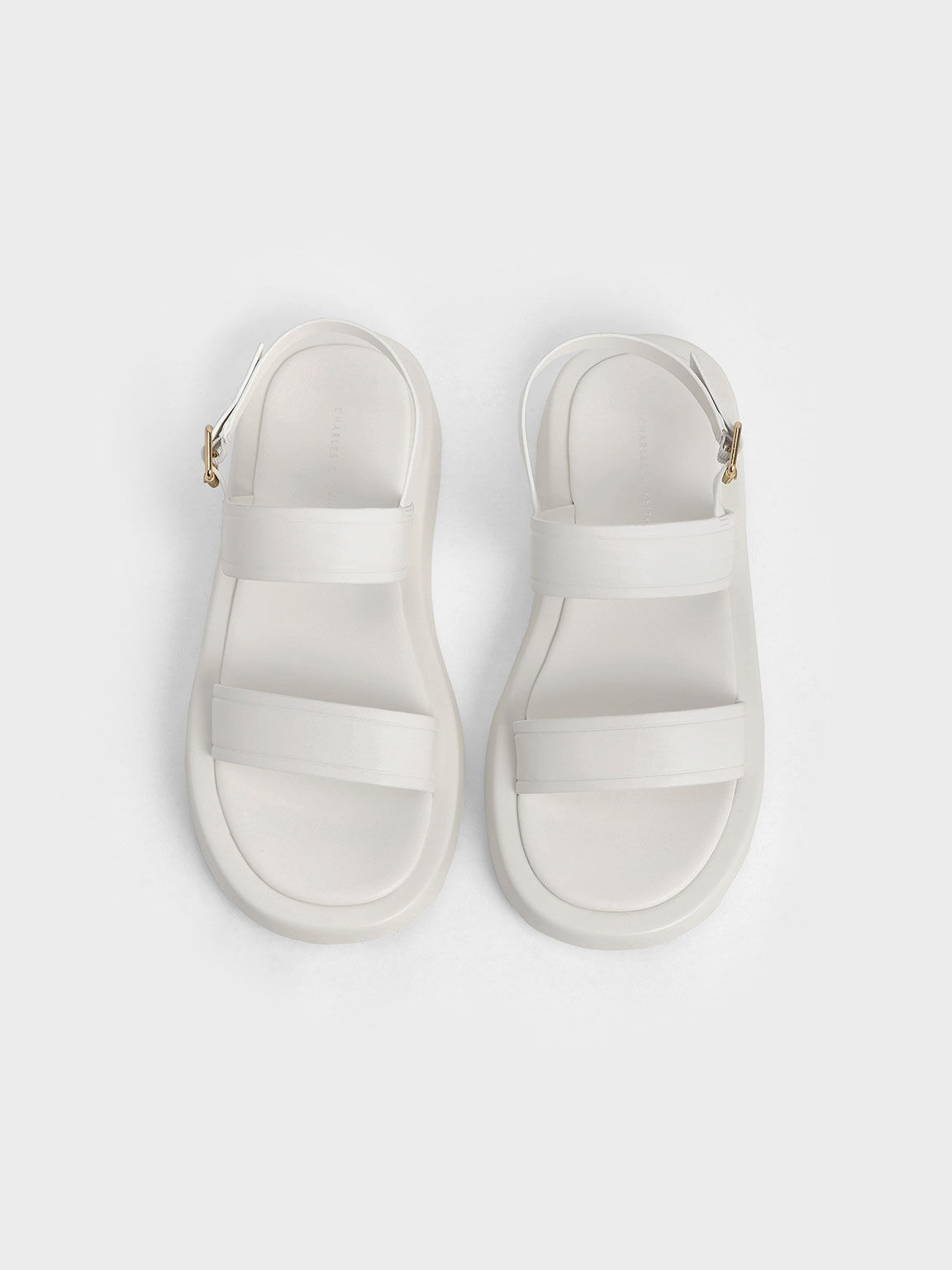 white plateau sandals