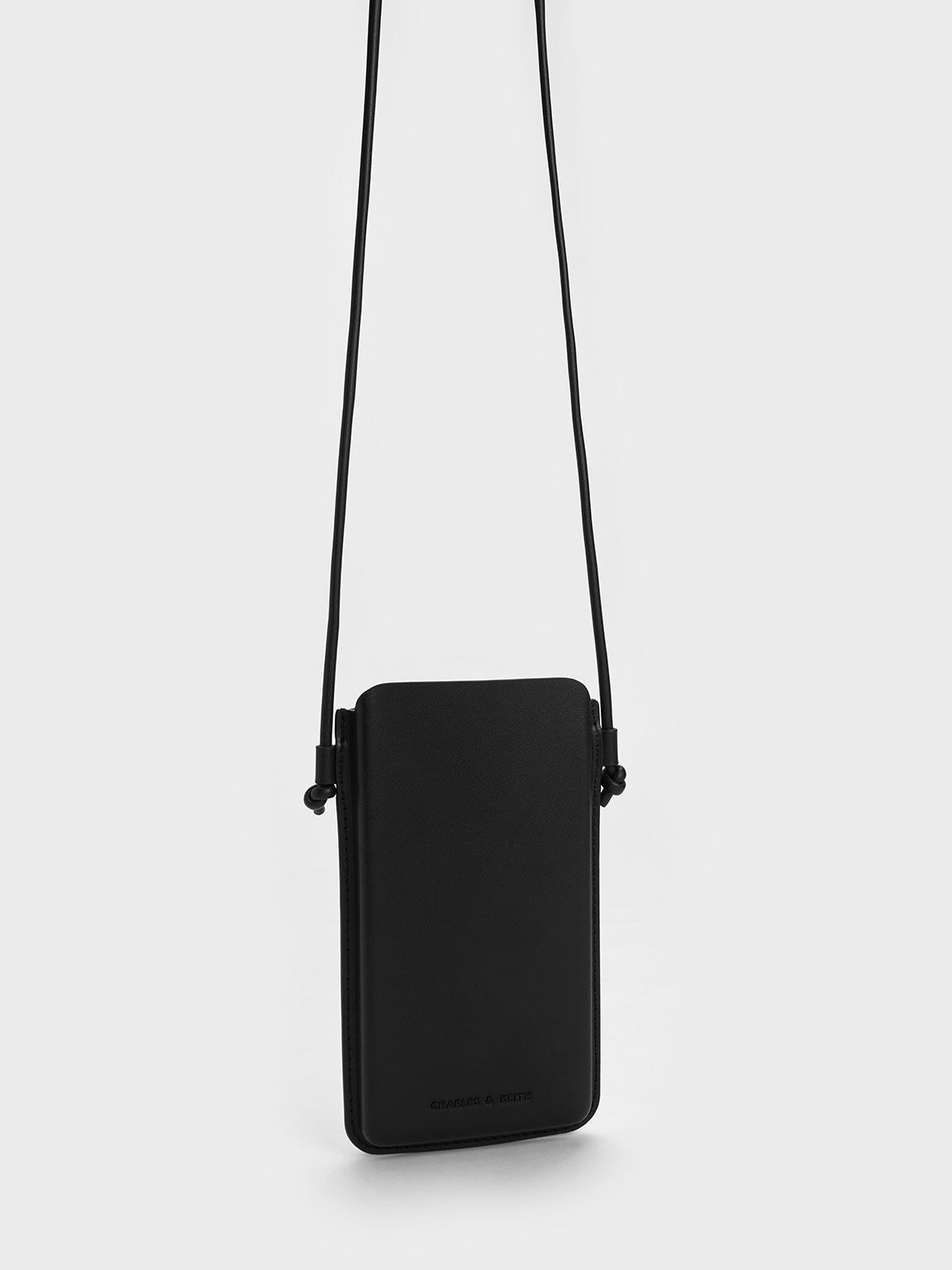 Black Camelia Phone Pouch - CHARLES & KEITH SG