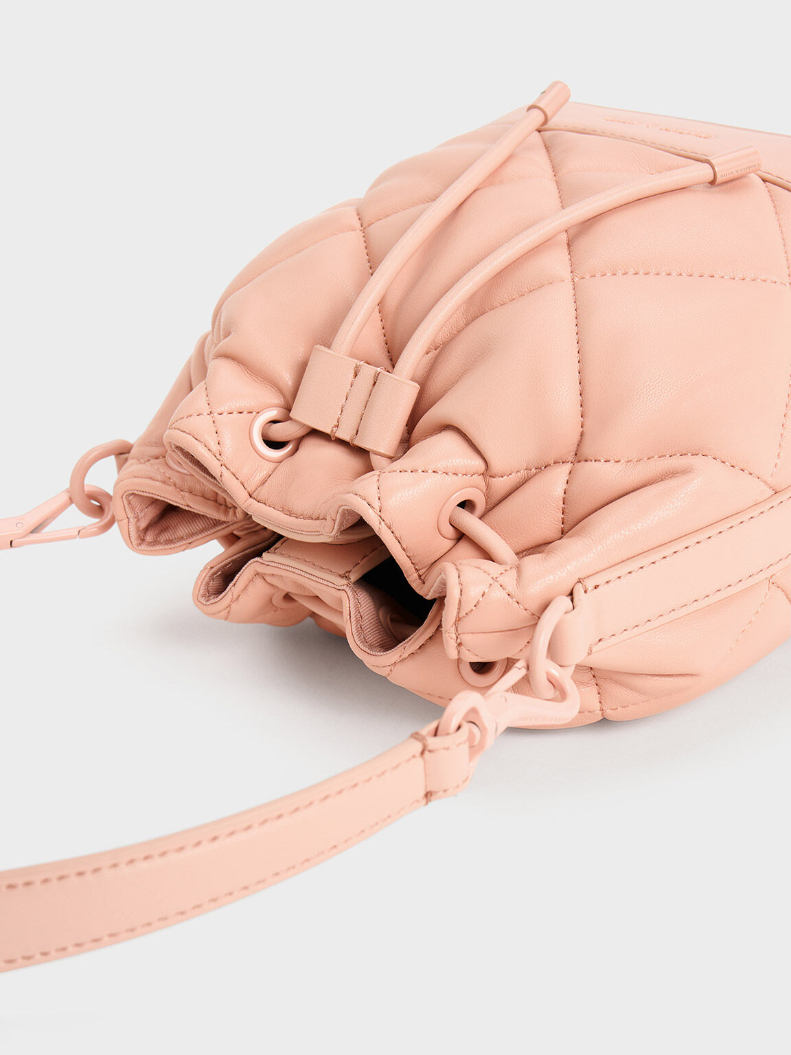 Pink Lin Quilted Bucket Bag - CHARLES & KEITH SG