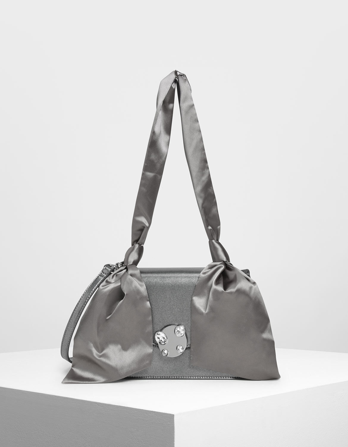 silver heels and bag