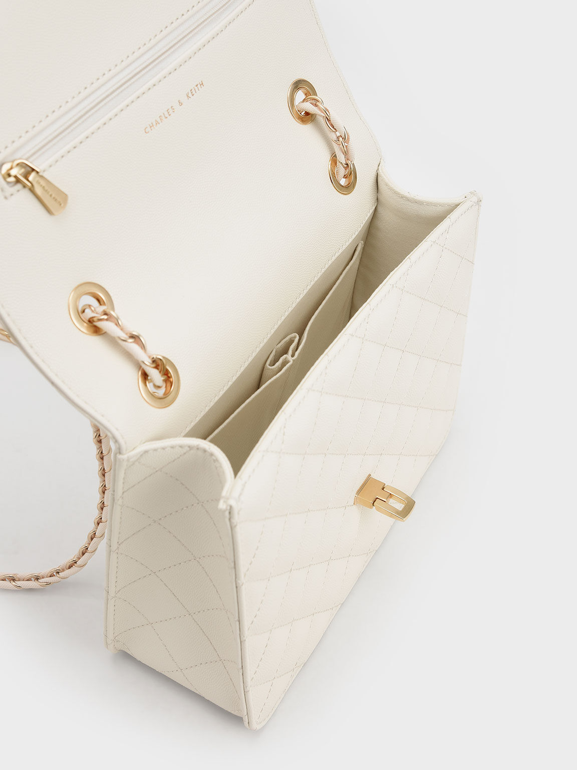 Cream Quilted Push-Lock Clutch Bag - CHARLES & KEITH MX