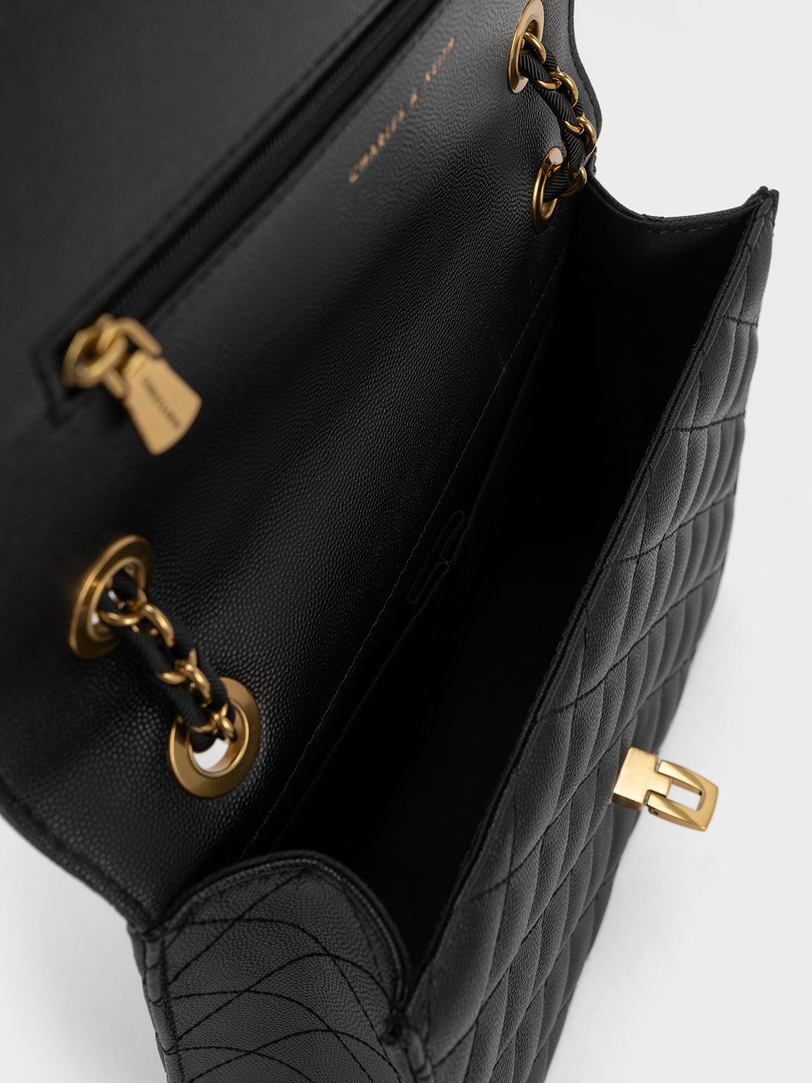 Charles & Keith Charles Keith Black Saddle Bag With Gold Chain Detail - $56  - From Emmy
