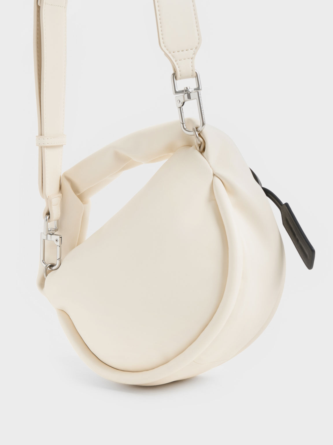 Charles & Keith Yama Padded Cylindrical Bag in Natural