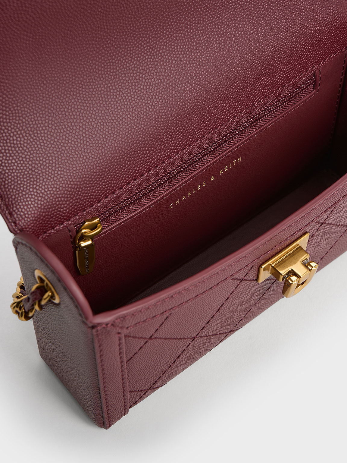 Burgundy Tallulah Quilted Push-Lock Clutch - CHARLES & KEITH US