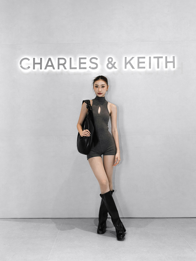 Toni Knotted Curved Hobo Bag and Robbie Platform Knee-High Boots, both in black - CHARLES & KEITH