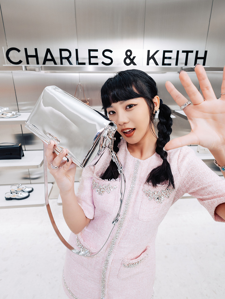 Women’s Matina metallic crossbody bag in silver, as seen on Lin Weini (Mu Mu) – CHARLES & KEITH