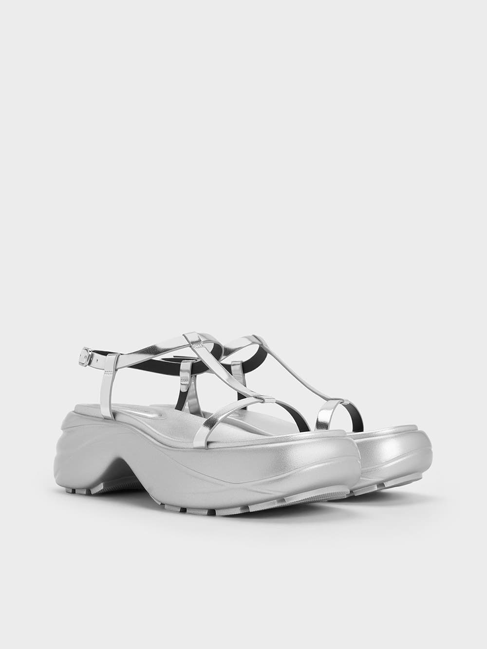 Sandalias deportivas con plataforma curvada y tira en T en plateado metalizado para mujer - CHARLES & KEITH