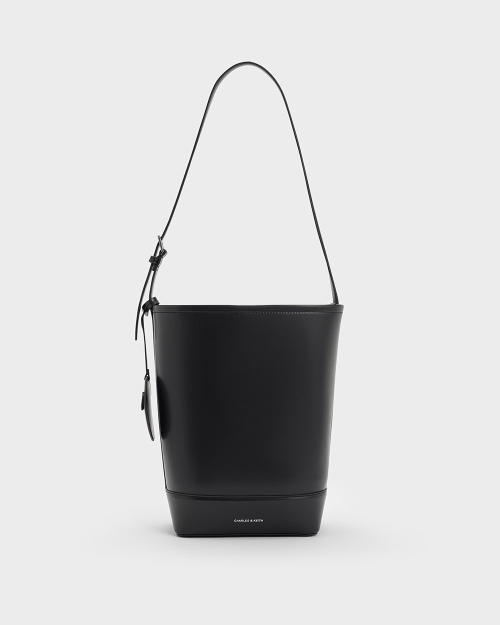 Women’s Enola Elongated Bucket Bag in black and Enola Canvas Elongated Bucket Bag in black - CHARLES & KEITH