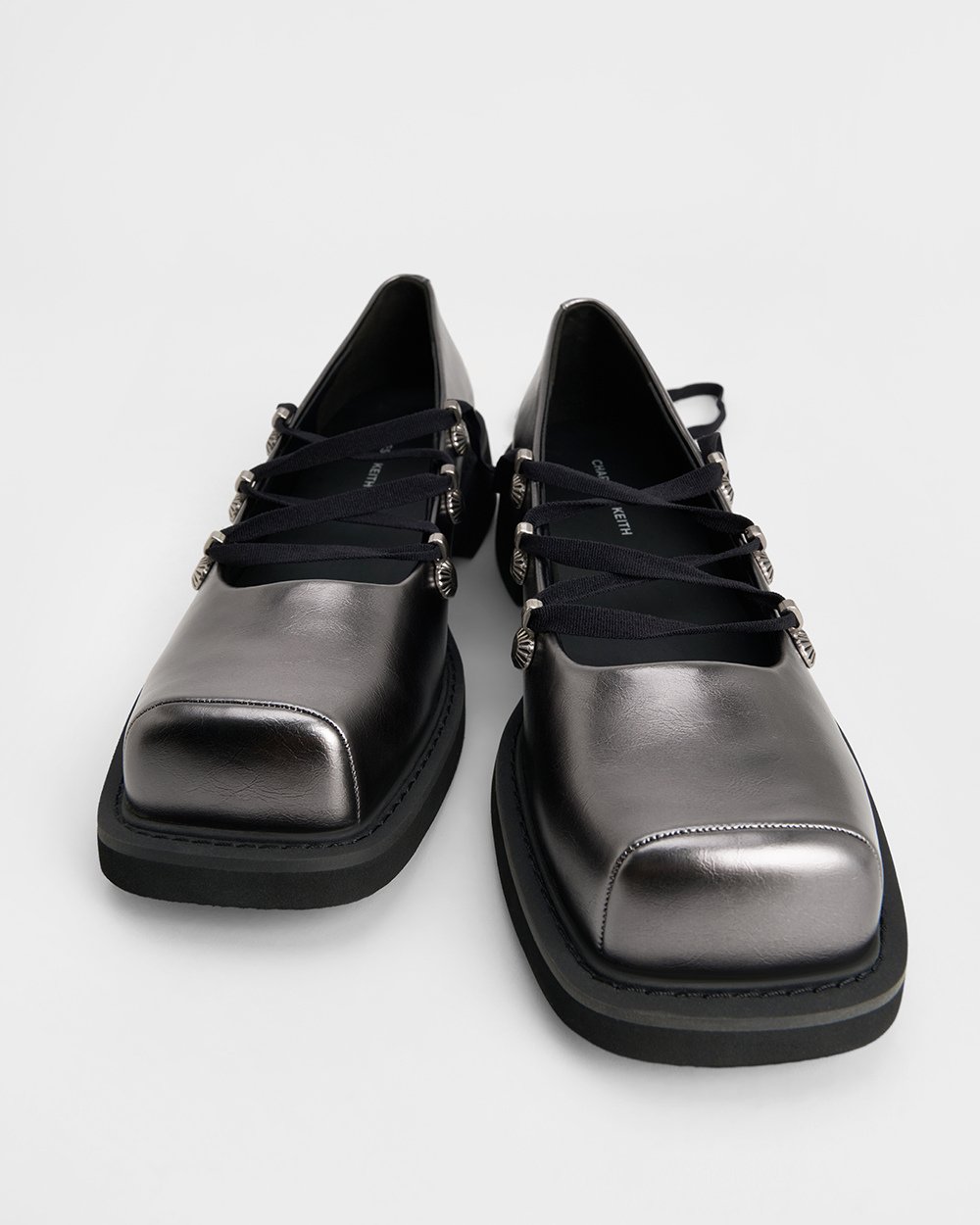 Women’s Heart-Embellished Lace-Up Ballet Flats in black and pewter - CHARLES & KEITH