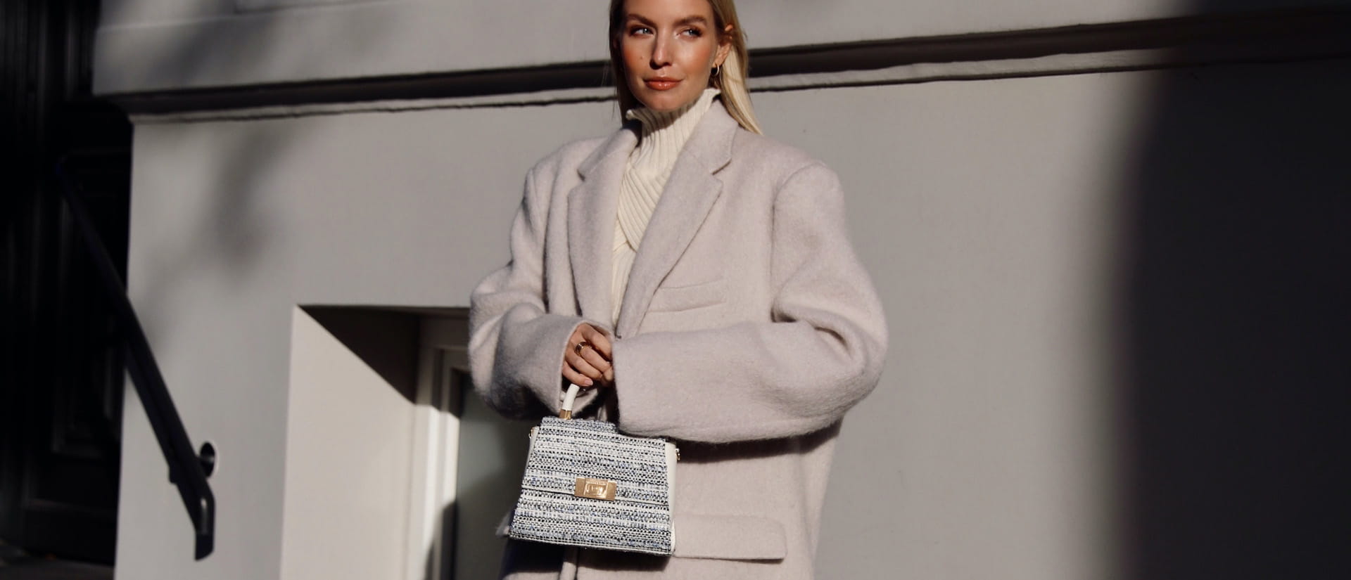 Leonie Hanne is seen wearing total look Chanel, phone bag, micro