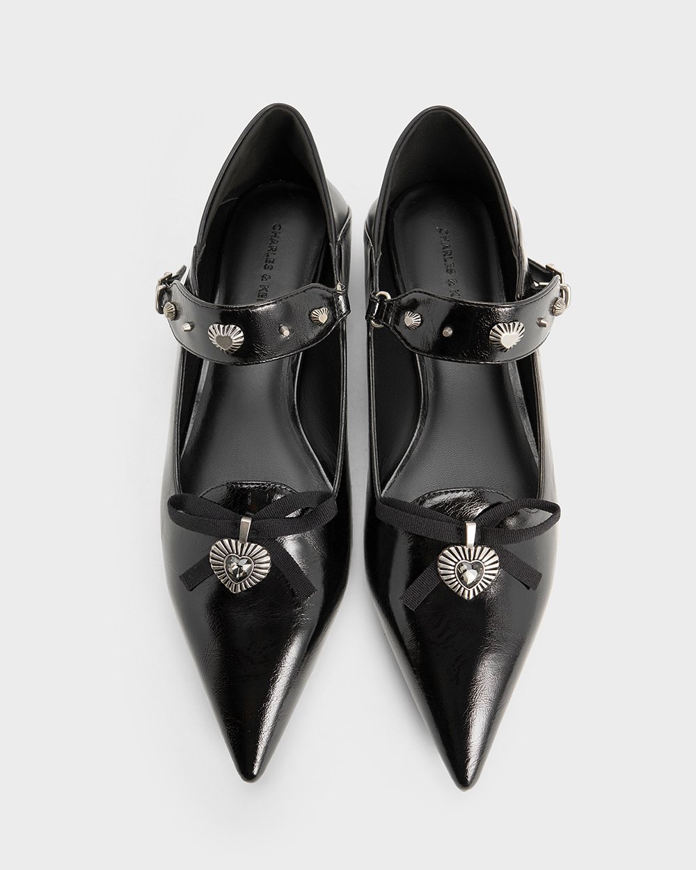 Women’s Studded Heart-Embellished Pointed-Toe Mary Janes in black and pewter - CHARLES & KEITH