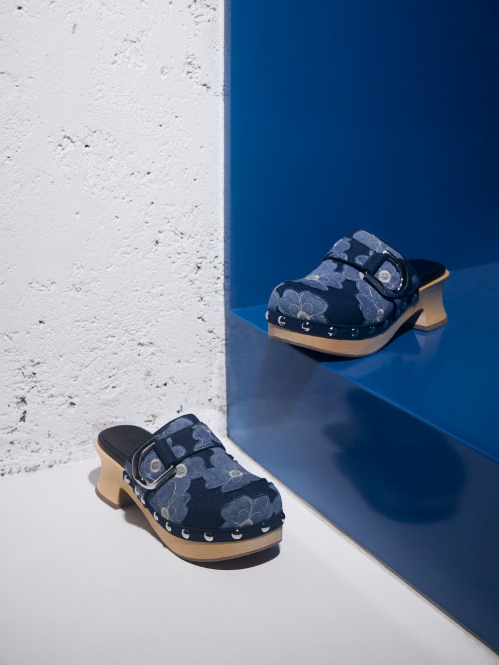 Women's blue Gabine floral denim studded clogs - CHARLES & KEITH