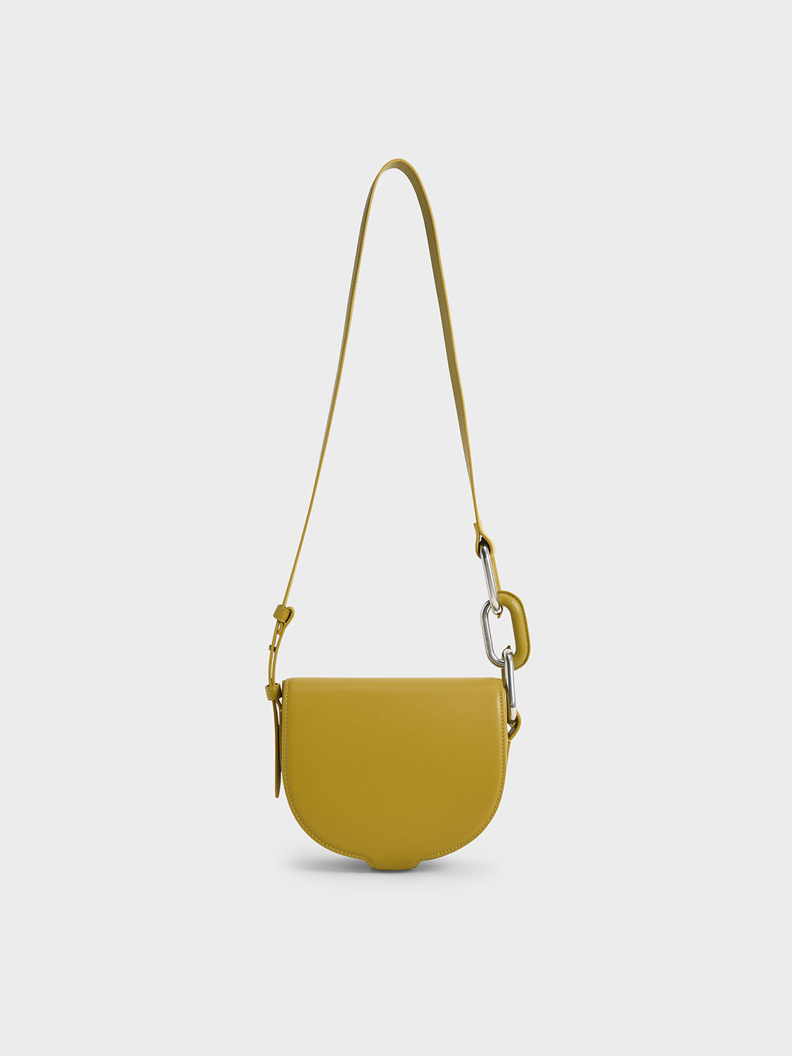 Charles & Keith Kora Saddle Crossbody Bag In Mustard 