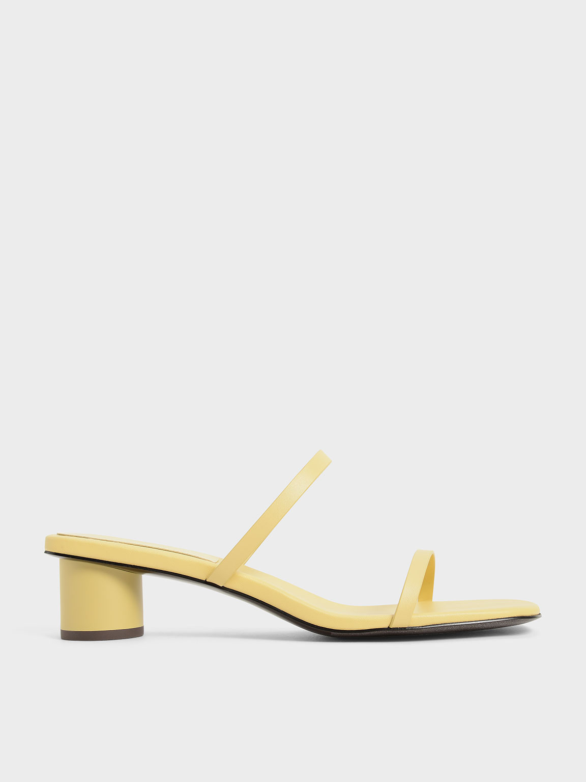 Charles And Keith Double Strap Cylindrical Heel Mules In Yellow Modesens
