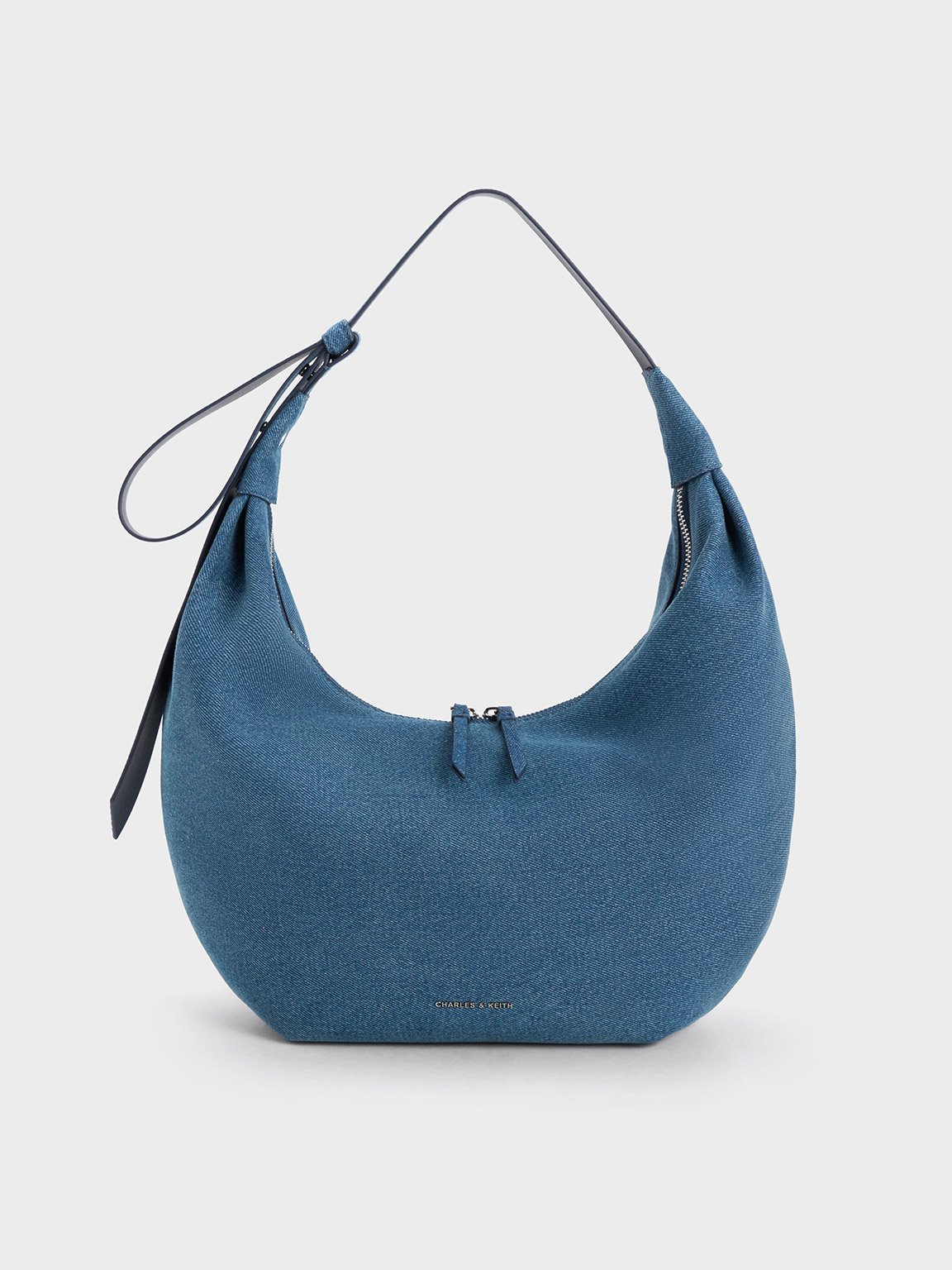 Blue Odella Denim Curved Hobo Bag | CHARLES & KEITH