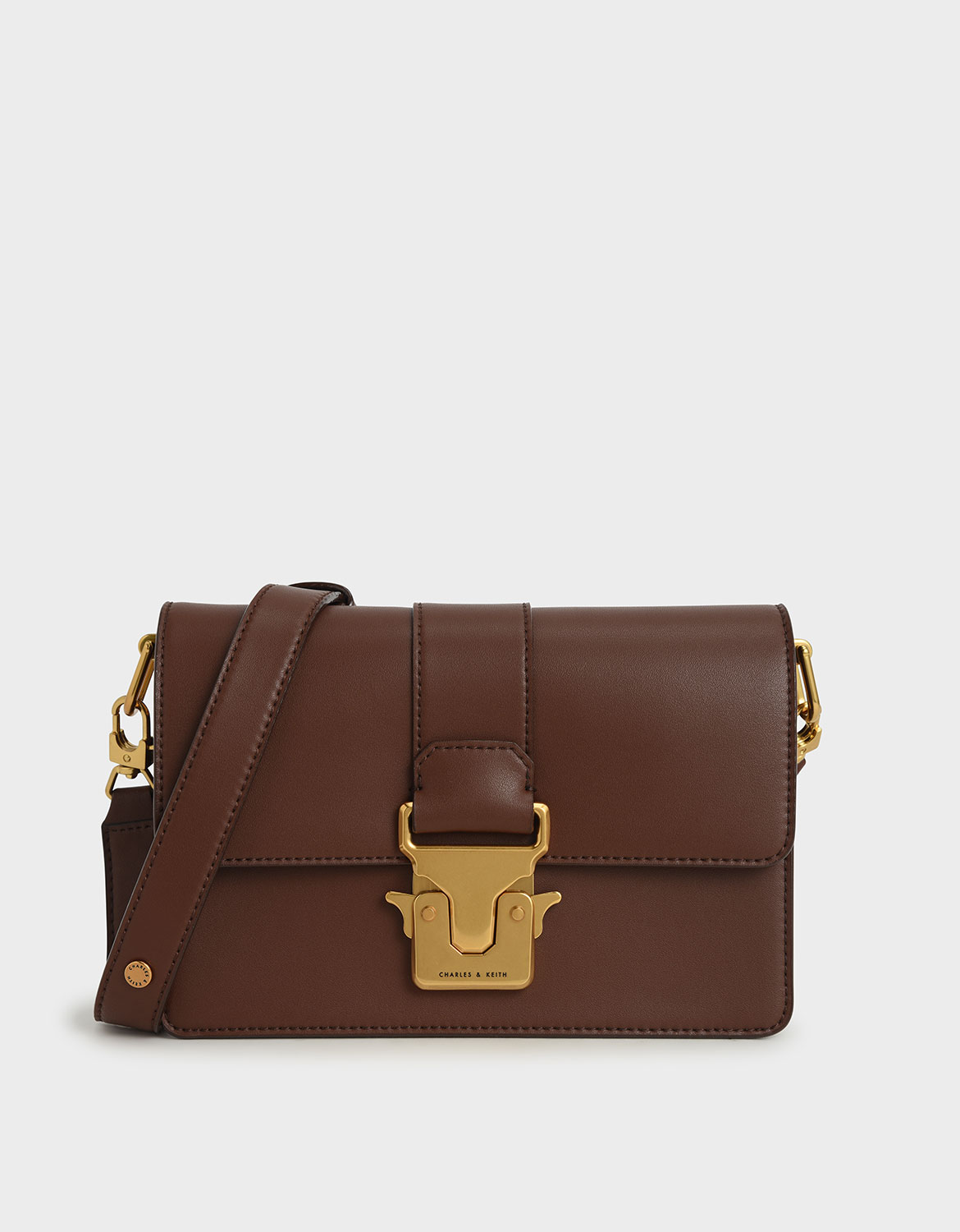 Metallic push lock crossbody online bag charles and keith