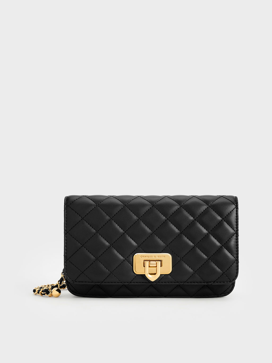 Black Cressida Quilted Push-Lock Clutch | CHARLES & KEITH