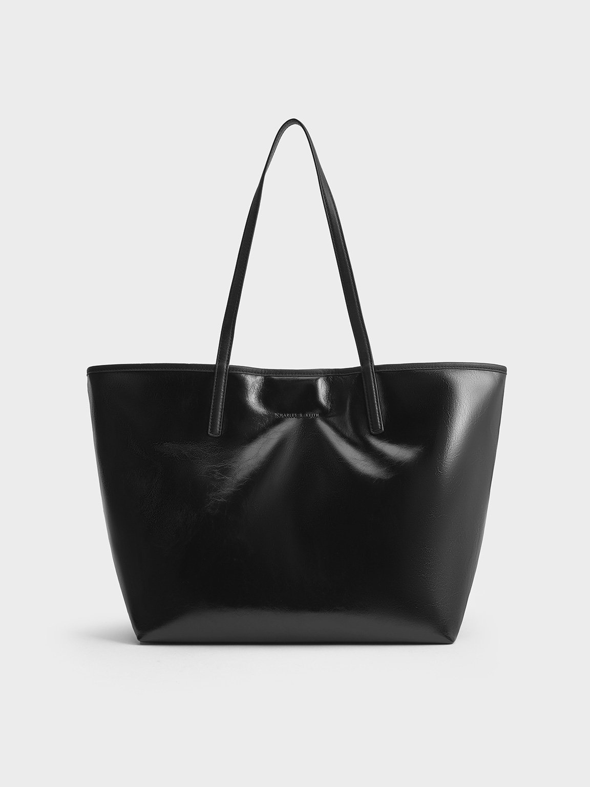 Noir Sianna Crinkle-Effect Reversible Tote Bag - CHARLES & KEITH ...