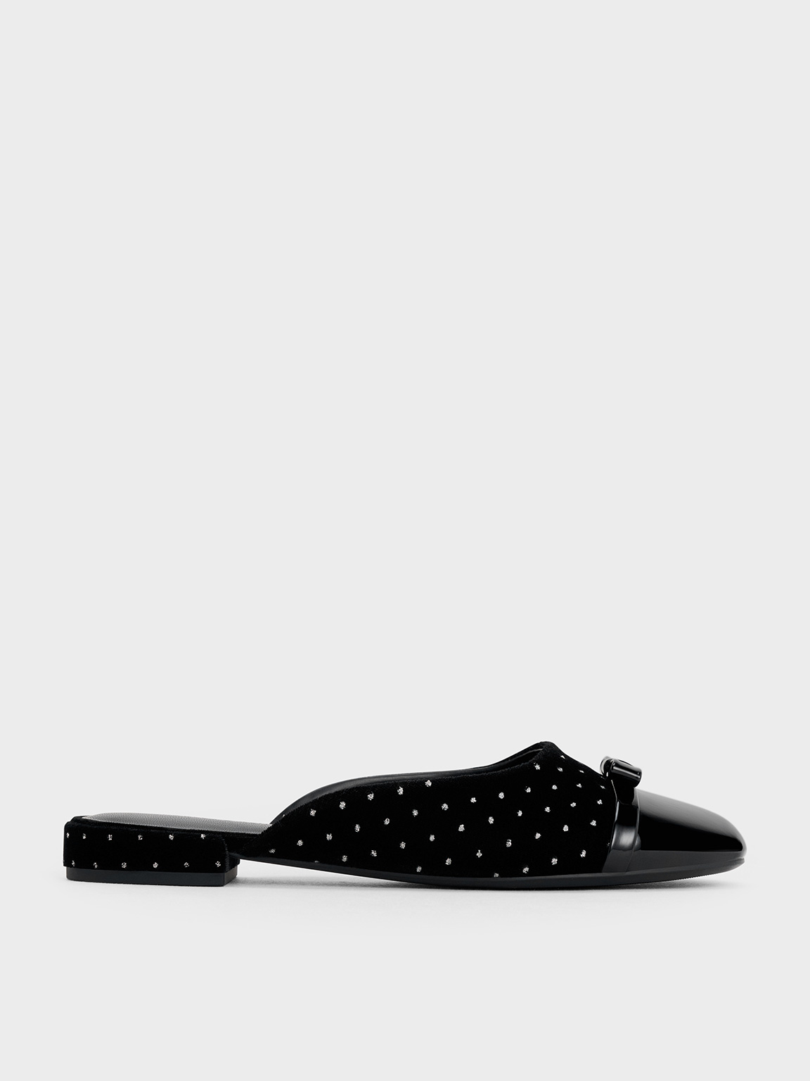 Black Textured Bow Dotted Cap-Toe Mules - CHARLES & KEITH SG