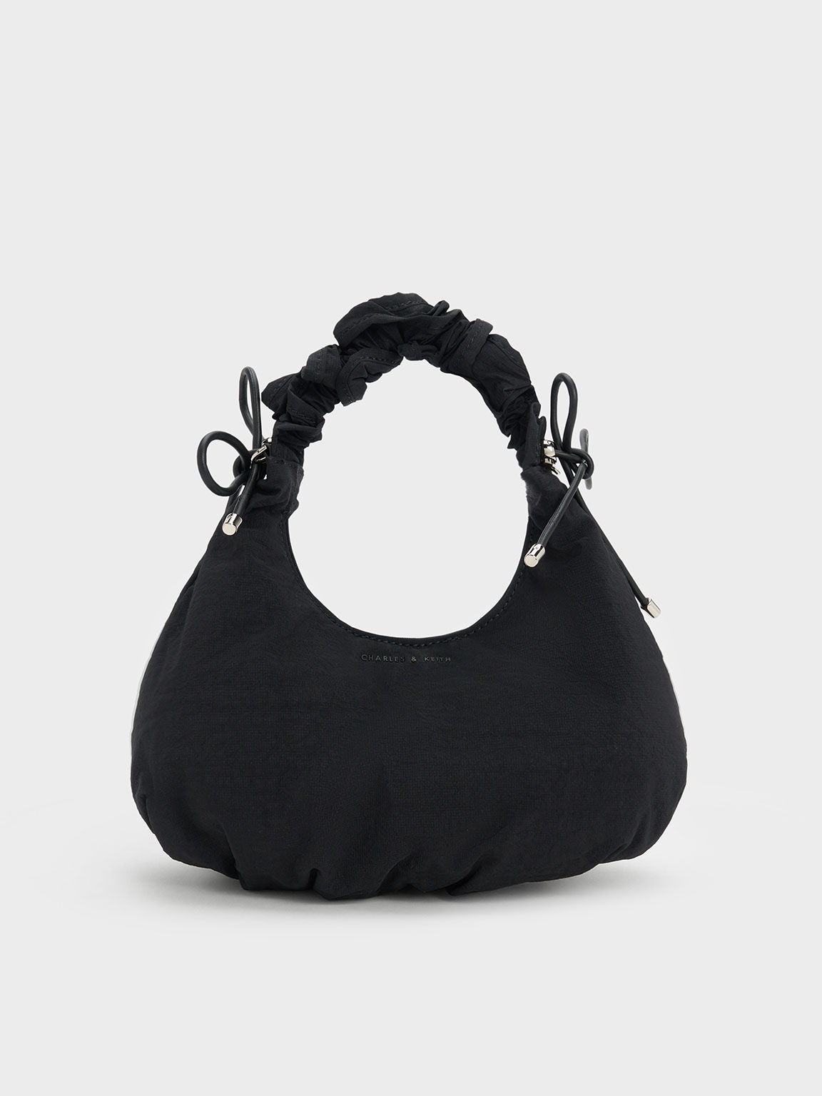 CHARLES & KEITH Heart-shaped crossbody bag in black as seen on
