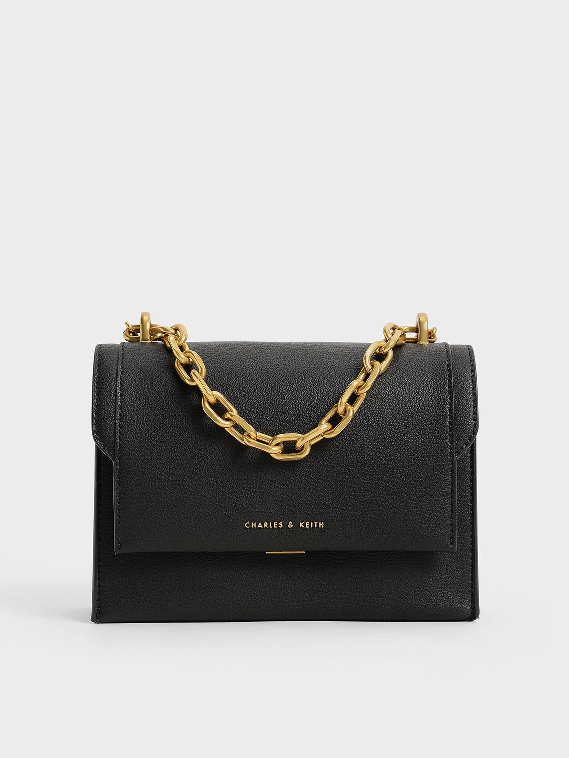 Charles & Keith card holder bag in black with gold chain strap